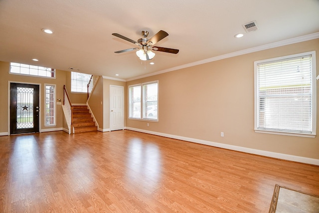 11707 Turtle Lake Dr, Houston, TX 77064 - unfurnished living room featuring baseboards, stairs, crown molding, a ceiling fan, and light wood finished floors
