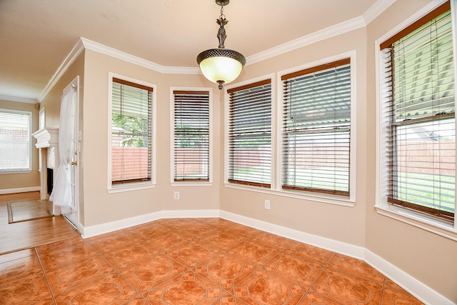 11707 Turtle Lake Dr, Houston, TX 77064 - unfurnished dining area with ornamental molding, healthy amount of natural light, and baseboards