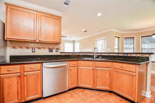 11707 Turtle Lake Dr, Houston, TX 77064 - kitchen featuring dishwasher, a sink, ornamental molding, dark stone counters, and a peninsula