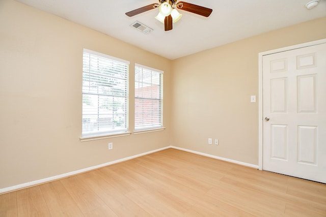 11707 Turtle Lake Dr, Houston, TX 77064 - spare room featuring light wood finished floors, ceiling fan, baseboards, and a smoke detector