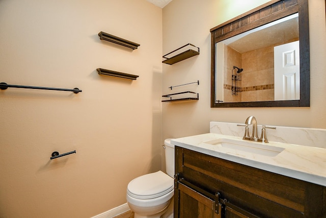 11707 Turtle Lake Dr, Houston, TX 77064 - bathroom featuring toilet, vanity, baseboards, and a shower
