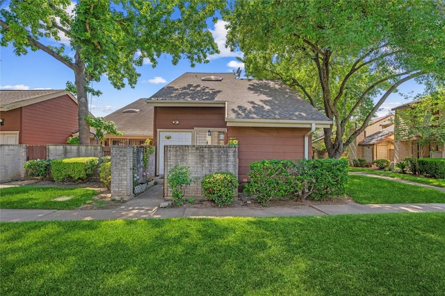 12574 Newbrook Dr, Houston, TX 77072 - view of front of property with a shingled roof and a gate