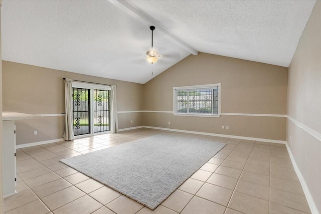2003 Sieber Dr, Houston, TX 77017 - empty room with healthy amount of natural light, ceiling fan, light tile patterned floors, a textured ceiling, and baseboards