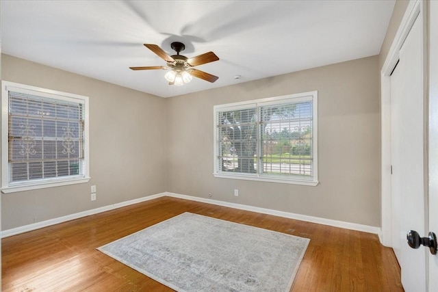 2003 Sieber Dr, Houston, TX 77017 - unfurnished bedroom featuring baseboards, wood finished floors, a closet, and ceiling fan