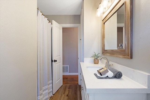 2003 Sieber Dr, Houston, TX 77017 - full bath featuring vanity and wood finished floors