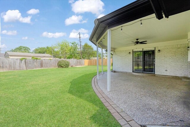 2003 Sieber Dr, Houston, TX 77017 - view of yard featuring a patio area and a ceiling fan