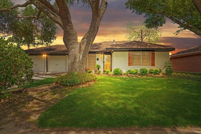 2003 Sieber Dr, Houston, TX 77017 - view of front of property with a garage, a yard, and concrete driveway