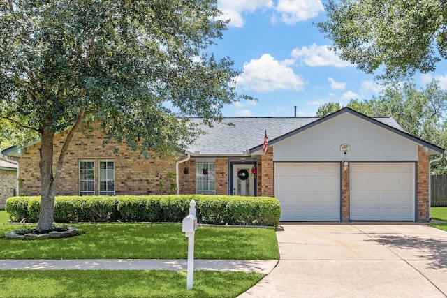 1926 Meadow Creek Dr, Pearland, TX 77581 - view of front of house with brick siding, a garage, a front lawn, and concrete driveway