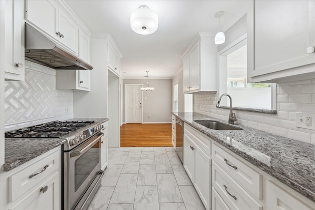 2322 Lamonte Ln, Houston, TX 77018 - kitchen featuring appliances with stainless steel finishes, a sink, under cabinet range hood, light marble finish flooring, and white cabinets
