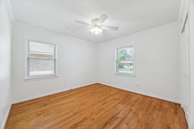 2322 Lamonte Ln, Houston, TX 77018 - spare room with crown molding, light wood-style floors, baseboards, and a ceiling fan