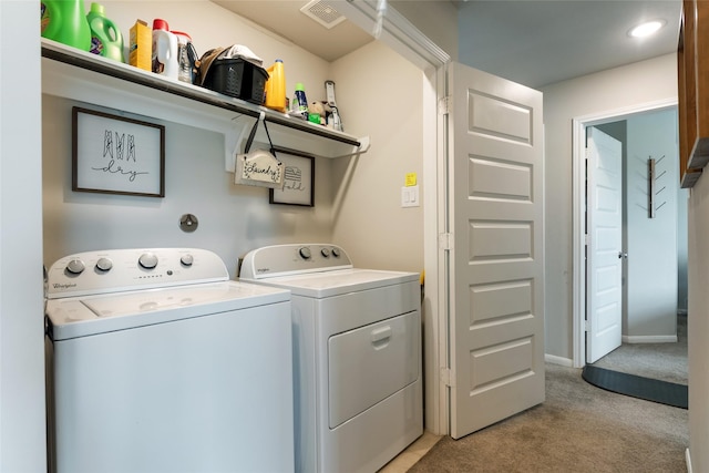 6303 Lemon Balm Ln, Crosby, TX 77532 - clothes washing area featuring independent washer and dryer and light carpet