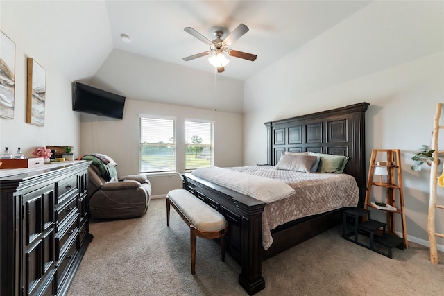 6303 Lemon Balm Ln, Crosby, TX 77532 - bedroom with light colored carpet, lofted ceiling, a ceiling fan, and baseboards