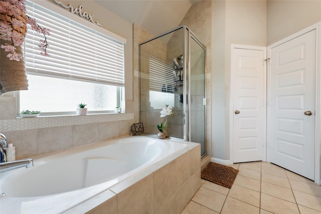 6303 Lemon Balm Ln, Crosby, TX 77532 - full bathroom featuring tile patterned floors, a shower stall, and a bath