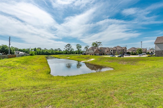 6303 Lemon Balm Ln, Crosby, TX 77532 - water view featuring nearby suburban area and fence