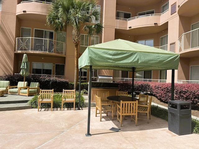 3505 Sage Rd Unit 602, Houston, TX 77056 - view of patio featuring outdoor dining area