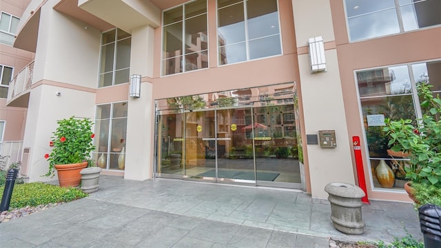 3505 Sage Rd Unit 602, Houston, TX 77056 - doorway to property with stucco siding
