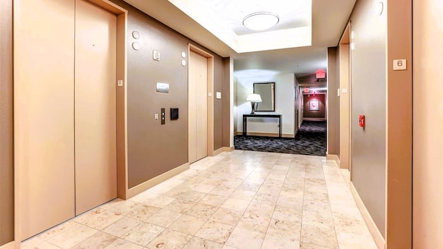 3505 Sage Rd Unit 602, Houston, TX 77056 - corridor with elevator, baseboards, and a raised ceiling