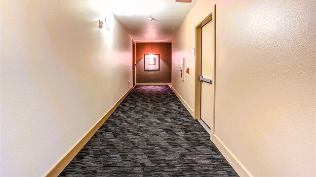 3505 Sage Rd Unit 602, Houston, TX 77056 - corridor with dark carpet and baseboards