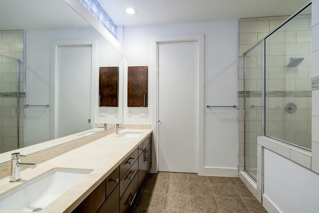 2356 Commerce, Houston, TX 77003 - full bathroom featuring a stall shower, double vanity, tile patterned flooring, and recessed lighting