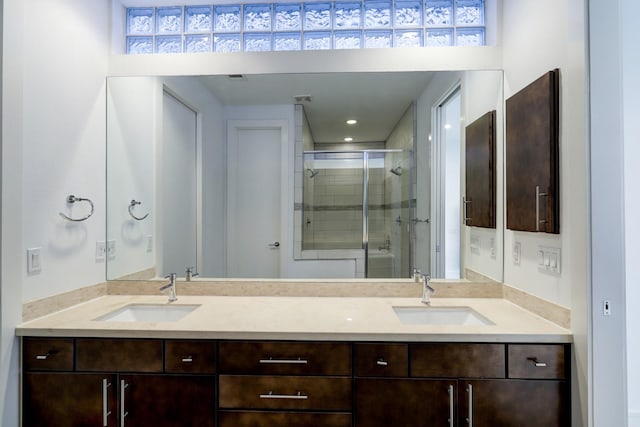 2356 Commerce, Houston, TX 77003 - bathroom featuring a shower stall and double vanity