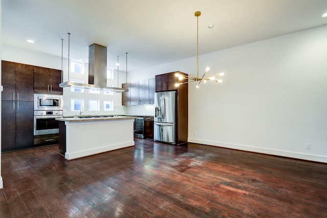 2356 Commerce, Houston, TX 77003 - kitchen with appliances with stainless steel finishes, island range hood, dark brown cabinetry, a chandelier, and recessed lighting