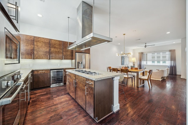 2356 Commerce, Houston, TX 77003 - kitchen featuring beverage cooler, stainless steel appliances, range hood, a kitchen island, and dark wood-style flooring