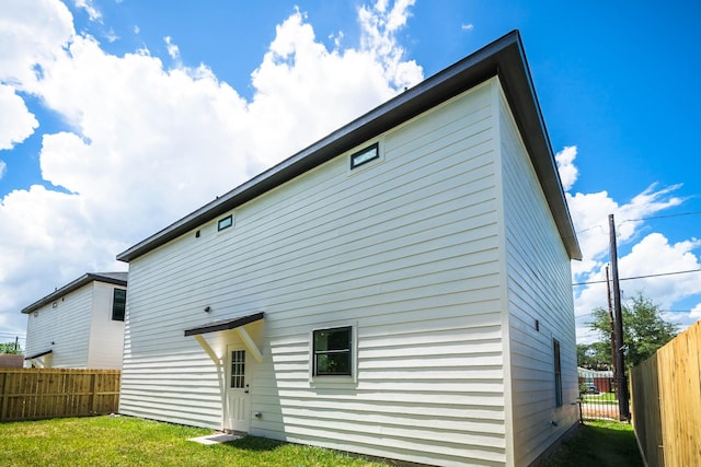 6322 Sayers St, Houston, TX 77026 - rear view of property with a fenced backyard