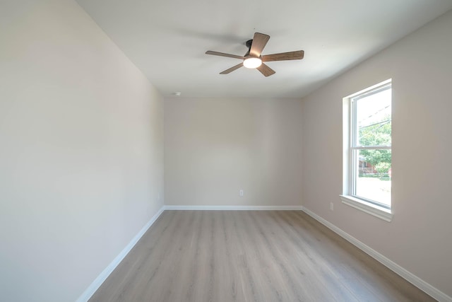 6322 Sayers St, Houston, TX 77026 - unfurnished room with light wood finished floors and ceiling fan