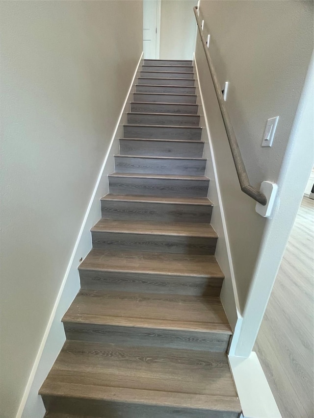 6322 Sayers St, Houston, TX 77026 - stairs with wood finished floors