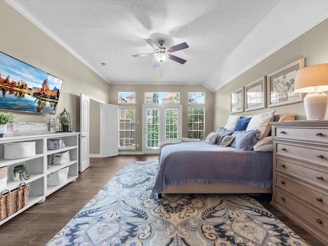 2815 Halton Ct, Kingwood, TX 77345 - bedroom featuring ornamental molding, dark wood finished floors, a textured ceiling, a ceiling fan, and baseboards