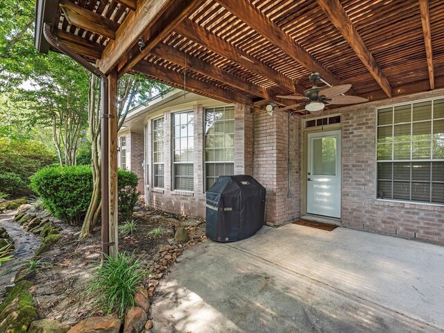 2815 Halton Ct, Kingwood, TX 77345 - view of patio featuring ceiling fan, a pergola, and a grill