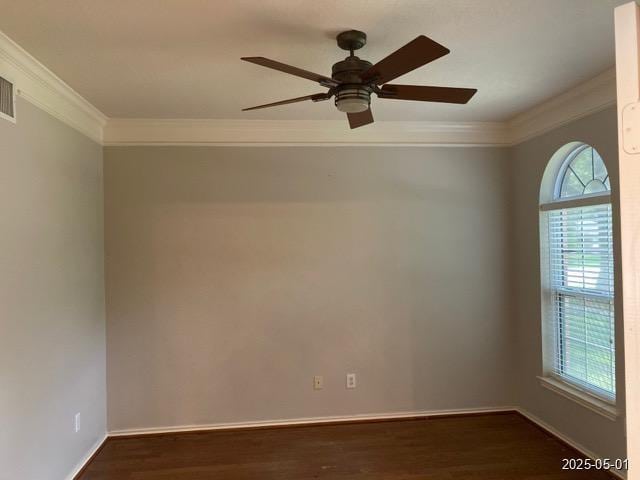 17523 Ginger Fields Ln, Tomball, TX 77377 - empty room featuring plenty of natural light, crown molding, a ceiling fan, dark wood-style floors, and baseboards