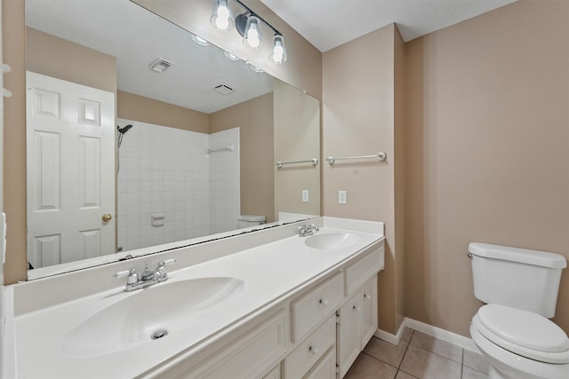 19042 Keyturn Ln, Humble, TX 77346 - full bath featuring toilet, tile patterned floors, a shower, baseboards, and double vanity