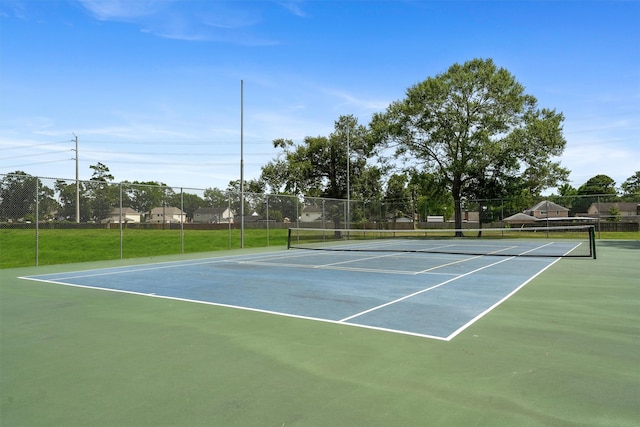 19042 Keyturn Ln, Humble, TX 77346 - view of tennis court with fence and community basketball court