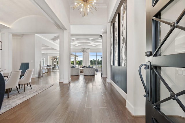 23314 Vista De Tres Lagos Dr, Spring, TX 77389 - foyer entrance with a chandelier, baseboards, and wood finished floors