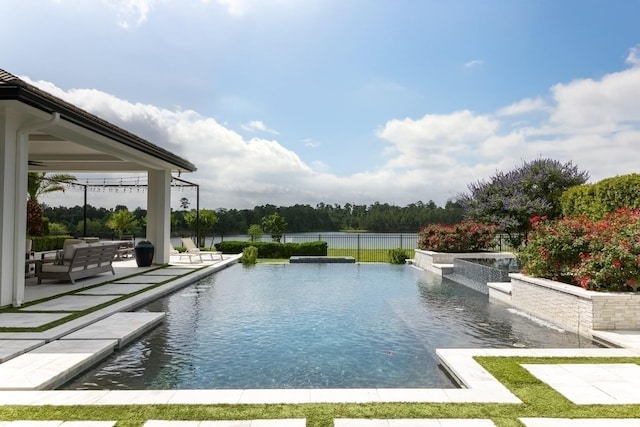 23314 Vista De Tres Lagos Dr, Spring, TX 77389 - view of pool featuring a patio area, an infinity pool, and a water view
