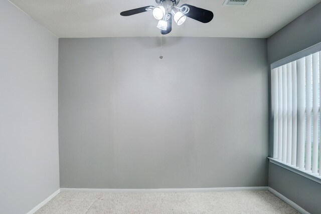 431 Cardinal Oaks, League City, TX 77565 - empty room featuring light colored carpet, baseboards, and ceiling fan