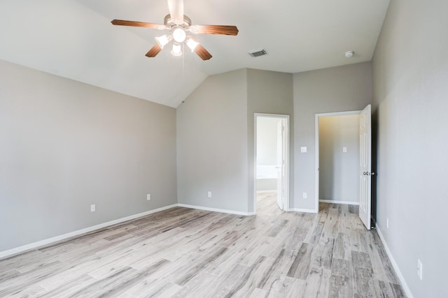 431 Cardinal Oaks, League City, TX 77565 - unfurnished bedroom with light wood-style flooring, vaulted ceiling, ceiling fan, and baseboards