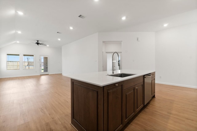 3315 Bristle Ridge Ln, Brookshire, TX 77423 - kitchen featuring a sink, stainless steel dishwasher, light countertops, light wood finished floors, and a ceiling fan