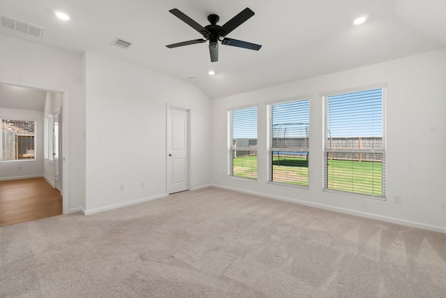 3315 Bristle Ridge Ln, Brookshire, TX 77423 - spare room featuring light carpet, baseboards, recessed lighting, lofted ceiling, and ceiling fan