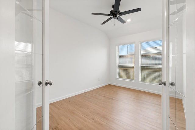 3315 Bristle Ridge Ln, Brookshire, TX 77423 - spare room featuring french doors, light wood-style flooring, baseboards, a ceiling fan, and lofted ceiling