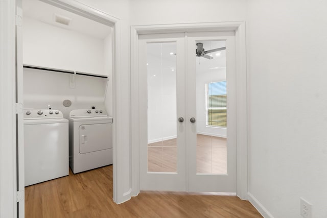 3315 Bristle Ridge Ln, Brookshire, TX 77423 - washroom featuring washer and clothes dryer, wood finished floors, french doors, and ceiling fan