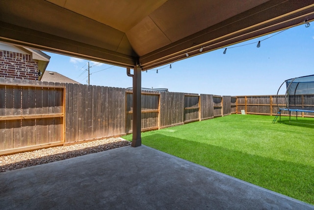 3315 Bristle Ridge Ln, Brookshire, TX 77423 - view of yard featuring a trampoline and a patio area