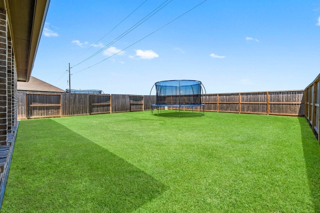 3315 Bristle Ridge Ln, Brookshire, TX 77423 - view of yard with a trampoline