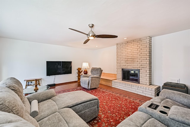 16358 Havenpark Dr, Houston, TX 77059 - living area with wood finished floors, ceiling fan, and a fireplace
