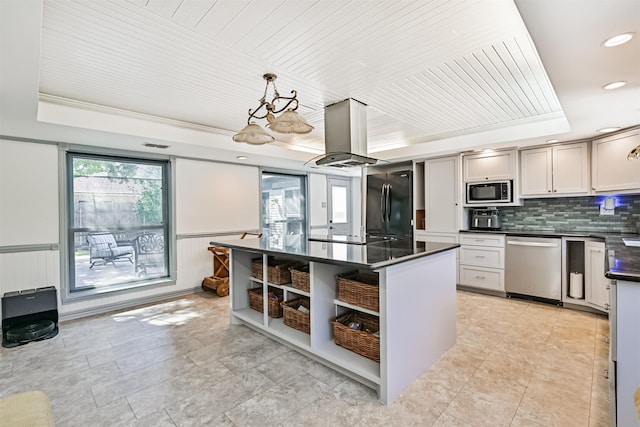 16358 Havenpark Dr, Houston, TX 77059 - kitchen featuring black appliances, a tray ceiling, dark countertops, open shelves, and a kitchen island