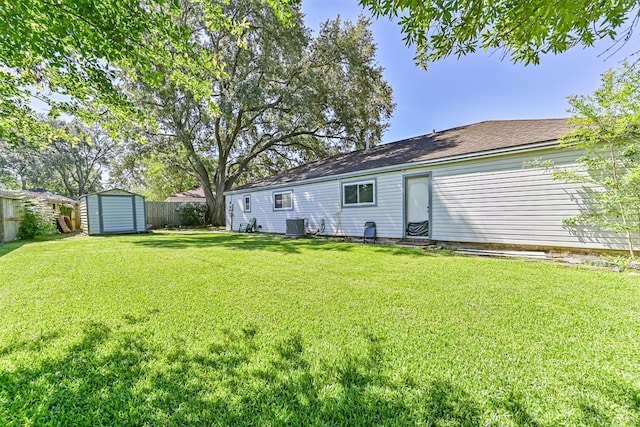 16358 Havenpark Dr, Houston, TX 77059 - back of property with a shed, an outdoor structure, and central AC