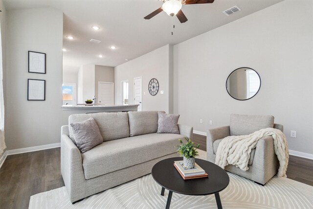 18414 Christine Elizabeth Ln, New Caney, TX 77357 - living room with ceiling fan, baseboards, dark wood-type flooring, and recessed lighting