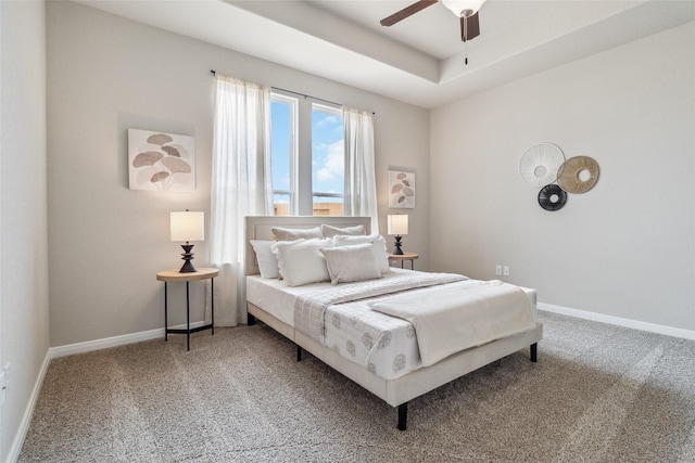 18414 Christine Elizabeth Ln, New Caney, TX 77357 - bedroom featuring carpet floors, baseboards, a ceiling fan, and a raised ceiling