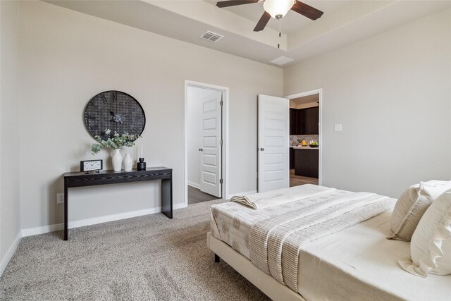 18414 Christine Elizabeth Ln, New Caney, TX 77357 - bedroom with carpet flooring, baseboards, ceiling fan, and a tray ceiling
